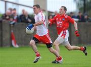 19 July 2008; Tommy McGuigan, Tyrone, in action against Jamie Carr, Louth. GAA Football All-Ireland Senior Campionship Qualifier - Round 1, Louth v Tyrone, Drogheda, Co. Louth. Picture credit: Brian Lawless / SPORTSFILE
