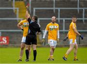 31 May 2015; Referee Maurice Deegan issues a red card to Sean McVeigh, Antrim, for a first half incident, as Kieran McGourty and Conor Murray looks on. Ulster GAA Football Senior Championship, Quarter-Final, Fermanagh v Antrim, Brewster Park, Enniskillen, Co. Fermanagh. Picture credit: Oliver McVeigh / SPORTSFILE