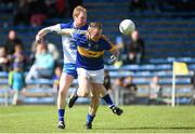 31 May 2015; Peter Acheson, Tipperary, in action against Liam O Lonain, Waterford. Munster GAA Football Senior Championship, Quarter-Final, Waterford v Tipperary. Semple Stadium, Thurles, Co. Tipperary. Picture credit: Diarmuid Greene / SPORTSFILE