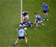 31 May 2015; Darren Daly, Dublin, passes the ball to team-mate Brian Fenton, despite the challenge of Longford players, left to right, Michael Quinn, Ronan McEntire, and Ross McNerney. Leinster GAA Football Senior Championship, Quarter-Final, Dublin v Longford, Croke Park, Dublin. Picture credit: Dáire Brennan / SPORTSFILE
