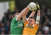 31 May 2015; Connor Burke, Antrim, in action against Sean Quigley, Fermanagh. Ulster GAA Football Senior Championship, Quarter-Final, Fermanagh v Antrim, Brewster Park, Enniskillen, Co. Fermanagh. Picture credit: Ramsey Cardy / SPORTSFILE