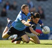 31 May 2015; Ross McInerney, Longford, in action against Dublin's Darren Daly. McInerney was carried off injured after the clash. Leinster GAA Football Senior Championship, Quarter-Final, Dublin v Longford, Croke Park, Dublin. Picture credit: Ray McManus / SPORTSFILE