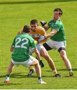 31 May 2015; Jack Dowling, Antrim, in action against Tomás Corrigan, right, and Daniel Kille, Fermanagh. Ulster GAA Football Senior Championship, Quarter-Final, Fermanagh v Antrim, Brewster Park, Enniskillen, Co. Fermanagh. Picture credit: Ramsey Cardy / SPORTSFILE
