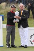 31 May 2015; Søren Kjeldsen, Denmark, receives the Irish Open Trophy from Colm McLaughlin representing Dubai Duty Free. Dubai Duty Free Irish Open Golf Championship 2015, Final Day. Royal County Down Golf Club, Co. Down. Picture credit: John Dickson / SPORTSFILE
