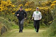 29 May 2015; Rory McIlroy, Northern Ireland, makes his way to the 4th tee box, accompanied by a security guard. Dubai Duty Free Irish Open Golf Championship 2015, Day 2. Royal County Down Golf Club, Co. Down. Picture credit: Brendan Moran / SPORTSFILE