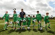 2 June 2015; Republic of Ireland and Everton midfielder Aiden McGeady officially launched the McDonald’s FAI Future Football 2015 programme. McDonald’s FAI Future Football is a programme designed to support grassroots football clubs by enriching the work they do at local level. Over 10,000 boys and girls from 165 football clubs in Ireland will take part this year, generating 70,000 additional hours of activity. This year McDonald’s will shine a special light on the 800 coaches that help run the programme, by rewarding them as a thank you for their tireless work in developing young footballers throughout the country. The partnership, in its third year, adds to McDonald’s global investment in football. Pictured at the launch was Republic of Ireland's Aiden McGeady, with children from left, twins Rachel and Sarah Fitzmaurice, age 9, twins Tadhg and Conor Scanlon, age 7, Ryan Enright, age 7, Isobel O'Kane, age 7, Evan O'Kane, age 9, and Callum Carroll, age 8. Gannon Park, Malahide, Co. Dublin Picture credit: David Maher / SPORTSFILE