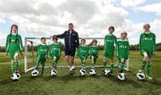 2 June 2015; Republic of Ireland and Everton midfielder Aiden McGeady officially launched the McDonald’s FAI Future Football 2015 programme. McDonald’s FAI Future Football is a programme designed to support grassroots football clubs by enriching the work they do at local level. Over 10,000 boys and girls from 165 football clubs in Ireland will take part this year, generating 70,000 additional hours of activity. This year McDonald’s will shine a special light on the 800 coaches that help run the programme, by rewarding them as a thank you for their tireless work in developing young footballers throughout the country. The partnership, in its third year, adds to McDonald’s global investment in football. Pictured at the launch was Republic of Ireland's Aiden McGeady, with children from left, Sarah Fitzmaurice, age 9, Ryan Enright, age 7, Isobel O'Kane, age 7, twins Tadhg and Conor Scanlon, age 7, Evan O'Kane, age 9, Callum Carroll, age 8, and Rachel Fitzmaurice, age 9. Gannon Park, Malahide, Co. Dublin Picture credit: David Maher / SPORTSFILE
