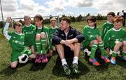 2 June 2015; Republic of Ireland and Everton midfielder Aiden McGeady officially launched the McDonald’s FAI Future Football 2015 programme. McDonald’s FAI Future Football is a programme designed to support grassroots football clubs by enriching the work they do at local level. Over 10,000 boys and girls from 165 football clubs in Ireland will take part this year, generating 70,000 additional hours of activity. This year McDonald’s will shine a special light on the 800 coaches that help run the programme, by rewarding them as a thank you for their tireless work in developing young footballers throughout the country. The partnership, in its third year, adds to McDonald’s global investment in football. Pictured at the launch was Republic of Ireland's Aiden McGeady, with children, from left, Tadhg Scanlon, age 7, twins Rachel and Sarah Fitzmaurice, age 9, Callum Carroll, age 8, Isobel O'Kane, age 7, Evan O'Kane, age 9, and Conor Scanlon, age 7. Gannon Park, Malahide, Co. Dublin Picture credit: David Maher / SPORTSFILE