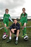 2 June 2015; Republic of Ireland and Everton midfielder Aiden McGeady officially launched the McDonald’s FAI Future Football 2015 programme. McDonald’s FAI Future Football is a programme designed to support grassroots football clubs by enriching the work they do at local level. Over 10,000 boys and girls from 165 football clubs in Ireland will take part this year, generating 70,000 additional hours of activity. This year McDonald’s will shine a special light on the 800 coaches that help run the programme, by rewarding them as a thank you for their tireless work in developing young footballers throughout the country. The partnership, in its third year, adds to McDonald’s global investment in football. Pitured at the launch was Republic of Ireland's Aiden McGeady with  twins  Sarah, left, and Rachel Fitzmaurice, age 9. Gannon Park, Malahide, Co. Dublin Picture credit: David Maher / SPORTSFILE