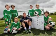 2 June 2015; Republic of Ireland and Everton midfielder Aiden McGeady officially launched the McDonald’s FAI Future Football 2015 programme. McDonald’s FAI Future Football is a programme designed to support grassroots football clubs by enriching the work they do at local level. Over 10,000 boys and girls from 165 football clubs in Ireland will take part this year, generating 70,000 additional hours of activity. This year McDonald’s will shine a special light on the 800 coaches that help run the programme, by rewarding them as a thank you for their tireless work in developing young footballers throughout the country. The partnership, in its third year, adds to McDonald’s global investment in football. Pictured at the launch was Republic of Ireland's Aiden McGeady with children from left, Tadhg Scanlon, age 7, Isobel O'Kane, age 7, Callum Carroll, age 8, Ryan Enright, age 7, Conor Scanlon, age 7, and Evan O'Kane, age 9. Gannon Park, Malahide, Co. Dublin Picture credit: David Maher / SPORTSFILE