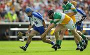 19 July 2008; Jamie Nagle, Waterford, in action against Joe Brady, Offaly. GAA Hurling All-Ireland Senior Championship Qualifier - Round 4, Offaly v Waterford, Thurles, Co. Tipperary. Picture credit: Ray McManus / SPORTSFILE