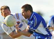 19 July 2008; Colm Parkinson, Laois, in action against Cathal Conefrey, Longford. GAA Football All-Ireland Senior Championship Qualifier, Round 1, Longford v Laois. Pearse Park, Longford. Picture credit: Ray Lohan / SPORTSFILE *** Local Caption ***