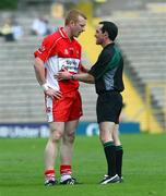 19 July 2008; Fergal Doherty, Derry, is spoken to by referee David Coldrick. GAA Football All-Ireland Senior Championship Qualifier - Round 1, Monaghan v Derry. Clones, Co. Monaghan. Picture credit: Oliver McVeigh / SPORTSFILE