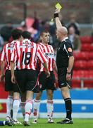 18 July 2008; Referee Richie Winters issues a yellow card to Niall McGinn, Derry City. eircom League Premier Division, Derry City v Bohemians, Brandywell, Derry, Co. Derry. Picture credit: Oliver McVeigh / SPORTSFILE