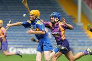 26 July 2008; Joanne Ryan, Tipperary, in action against Aoife O'Connor, Wexford. Gala All-Ireland Senior Camogie Championship, Tipperary v Wexford, Semple Stadium, Thurles, Co. Tipperary. Picture credit: Matt Browne / SPORTSFILE