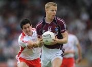 26 July 2008; Denis Glennon, Westmeath, in action against P.J. Quinn, Tyrone. GAA Football All-Ireland Senior Championship Qualifier, Round 2, Tyrone v Westmeath, Healy Park, Omagh, Co. Tyrone. Photo by Sportsfile