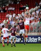26 July 2008; Enda McGinley, Tyrone, in action against Donal O'Donoghue, Westmeath. GAA Football All-Ireland Senior Championship Qualifier - Round 2, Tyrone v Westmeath, Healy Park, Omagh, Co. Tyrone. Photo by Sportsfile