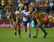 24 July 2008; Vincent Corey, Monaghan, in action against Christy Toye and Neil Gallagher, Donegal. GAA Football All-Ireland Senior Championship Qualifier - Round 2, Donegal v Monaghan, Ballybofey, Co. Donegal. Picture credit: Oliver McVeigh / SPORTSFILE