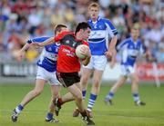 26 July 2008; Colm Murney, Down, in action against Colm Parkinson, Laois. GAA Football All-Ireland Senior Championship Qualifier - Round 2, Laois v Down, O'Moore Park, Portlaoise. Picture credit: Matt Browne / SPORTSFILE