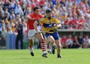 27 July 2008; Niall Gilligan, Clare, in action against Sean Og O hAilpin, Cork. GAA Hurling All-Ireland Senior Championship Quarter-Final, Clare v Cork, Semple Stadium, Thurles, Co. Tipperary. Picture credit: Stephen McCarthy / SPORTSFILE