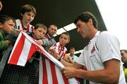 28 July 2008; Sunderland manager Roy Keane signs autographs before the start of the game. Pre-season friendly, Cobh Ramblers v Sunderland, Turners Cross, Cork. Picture credit: David Maher / SPORTSFILE