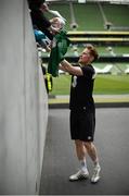 3 June 2015; Republic of Ireland's Stephen Quinn signs autographs for supporters at the end of squad training. Republic of Ireland Squad Training, Aviva Stadium, Lansdowne Road, Dublin. Picture credit: David Maher / SPORTSFILE