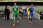 4 June 2015; The two captains, Stephen Ward, Republic of Ireland, and Steven Davis, Northern Ireland, lead out the teams for the start of the game. Training Match, Republic of Ireland v Northern Ireland. Aviva Stadium, Lansdowne Road, Dublin. Picture credit: David Maher / SPORTSFILE