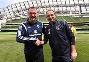 4 June 2015; Michael O'Neill, Northern Ireland manager shakes hands with Republic of Ireland manager Martin O'Neill at the end of the game. Training Match, Republic of Ireland v Northern Ireland. Aviva Stadium, Lansdowne Road, Dublin. Picture credit: David Maher / SPORTSFILE