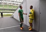 4 June 2015; John O'Shea, Republic of Ireland, chats with Northern Ireland goalkeeper Roy Carroll at the end of the game. Training Match, Republic of Ireland v Northern Ireland. Aviva Stadium, Lansdowne Road, Dublin. Picture credit: David Maher / SPORTSFILE