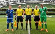 4 June 2015; Referee Paul McLaughlin with captains Stephen Ward, far right,  Republic of Ireland, and Steven Davis, far left, Northern Ireland, and linesmen Robert Clarke, second from left, and Wayne McDonnell, second from right. Training Match, Republic of Ireland v Northern Ireland. Aviva Stadium, Lansdowne Road, Dublin. Picture credit: David Maher / SPORTSFILE