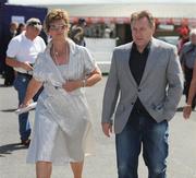 30 July 2008; Former Ireland rugby manager Eddie O'Sullivan and his wife Noreen during the third day of the Galway Racing Festival. Galway Racing Festival - Wednesday, Ballybrit, Galway. Picture credit: Stephen McCarthy / SPORTSFILE