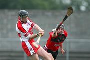 30 July 2008; Paddy McCloskey, Derry, in action against Patrick Flynn, Down. Bord Gais Ulster U21 Hurling Championship, Down v Derry, Ballycran, Co. Down. Picture credit: Oliver McVeigh / SPORTSFILE