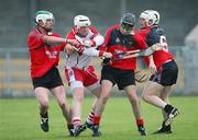 30 July 2008; Michael Kirkpatrick, Derry, in action against Michael McCartan, Sean Ennis and Brian Bell, Down. Bord Gais Ulster U21 Hurling Championship, Down v Derry, Ballycran, Co. Down. Picture credit: Oliver McVeigh / SPORTSFILE