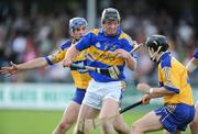 30 July 2008; Seamus Hennessy, Tipperary, in action against James McInerney, left, and Ciaran O'Doherty, Clare. Bord Gais Munster GAA Hurling U21 Championship Final - Clare v Tipperary. Cusack Park, Ennis, Co. Clare. Picture credit: Matt Browne / SPORTSFILE