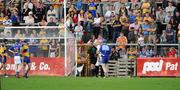 30 July 2008; Clare goalkeeper Donal Touhy remonstrates with an umpire after the umpire had spoken to referee Jason O'Mahony. Bord Gais Munster GAA Hurling U21 Championship Final, Clare v Tipperary, Cusack Park, Ennis, Co. Clare. Picture credit: Matt Browne / SPORTSFILE