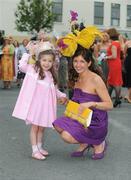 31 July 2008; Carol Kennelly with her daughter Rosie, age 4, from Tralee, Co. Kerry, during Ladies Day of the Galway Racing Festival. Galway Racing Festival, Ballybrit, Co. Galway. Picture credit: Stephen McCarthy / SPORTSFILE