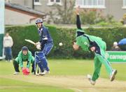 31 July 2008; Colin Smith, Scotland, plays the bowel from Alex Cusack, Ireland as wicketkeeper Niall O'Brien watches the ball. Ireland v Scotland, One Day International, Clontarf Cricket Club, Dublin. Picture credit: Matt Browne / SPORTSFILE