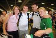 1 August 2008; Members of the Ireland Olympic Athletics team, from left, Joanne Cuddihy, 400m, Paul Hession, 200m, David Gillick, 400m, and Eileen O'Keeffe, Hammer, prepare to depart for Beijing. Dublin Airport, Dublin. Picture credit: Brian Lawless / SPORTSFILE