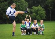 31 July 2008; The 9th annual MBNA Kick Fada competition was launched at Herbert Park, over 20 Inter-County Gaelic Football stars are set to compete for the prestigious All-Ireland title at the 2008 MBNA Kick Fada Final, which takes place on Saturday 13th at Bray Emmets GAA Club. Reigning champion John Brennan, from Carlow, will be back to defend his title after winning with a kick of 67 metres. At the launch is Dublin master free taker Tomas Quinn cheered on by Bray Emmets GAA members, from left, Peter Duffy, Grier Curley, Conor Plower, and Tom Carden. Herbert Park Hotel, Ballsbridge, Dublin Picture credit: Brian Lawless / SPORTSFILE