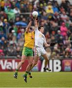 17 May 2015; Colm Cavanagh, Tyrone, in action against Neil Gallagher, Donegal. Ulster GAA Football Senior Championship, Preliminary Round, Donegal v Tyrone. MacCumhaill Park, Ballybofey, Co. Donegal. Picture credit: Stephen McCarthy / SPORTSFILE