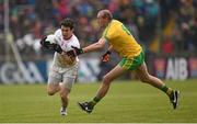 17 May 2015; Mattie Donnelly, Tyrone, is tackled by Neil Gallagher, Donegal. Ulster GAA Football Senior Championship, Preliminary Round, Donegal v Tyrone. MacCumhaill Park, Ballybofey, Co. Donegal. Picture credit: Stephen McCarthy / SPORTSFILE