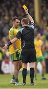 17 May 2015; Referee Joe McQuillan issues a yellow card to Karl Lacey, Donegal. Ulster GAA Football Senior Championship, Preliminary Round, Donegal v Tyrone. MacCumhaill Park, Ballybofey, Co. Donegal. Picture credit: Stephen McCarthy / SPORTSFILE