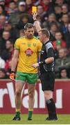 17 May 2015; Referee Joe McQuillan issues a yellow card to Christy Toye, Donegal. Ulster GAA Football Senior Championship, Preliminary Round, Donegal v Tyrone. MacCumhaill Park, Ballybofey, Co. Donegal. Picture credit: Stephen McCarthy / SPORTSFILE