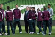 6 June 2015; England players from left; Joe Hart, Adam Lallana, Gary Cahill, Wayne Rooney, James Milner, Jack Wilshere, Fabian Delph, Nathaniel Clyne and Chris Smalling with manager Roy Hodgson on the pitch at the Aviva Staduim, Lansdowne Road, Dublin. Picture credit: David Maher / SPORTSFILE