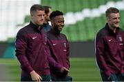 6 June 2015; England's Ross Barkeley, left, and Raheem Sterling walks on to the pitch with debutant Jamie Vardy at the Aviva Stadium, Lansdowne Road, Dublin. Picture credit: David Maher / SPORTSFILE