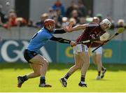 6 June 2015; Andrew Smith, Galway, hand passes under pressure from Ryan O'Dwyer, Dublin. Leinster GAA Hurling Senior Championship Quarter-Final Replay, Dublin v Galway. O'Connor Park, Tullamore, Co. Offaly. Picture credit: Piaras Ó Mídheach / SPORTSFILE