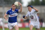 6 June 2015; Donal Kingston, Laois, in action against Mick O'Grady, Kildare. Leinster GAA Football Senior Championship Quarter-Final, Kildare v Laois. O'Connor Park, Tullamore, Co. Offaly. Picture credit: Stephen McCarthy / SPORTSFILE