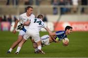 6 June 2015; Brendan Quigley, Laois, in action against Tommy Moolick and Alan Smith, 14, Kildare. Leinster GAA Football Senior Championship Quarter-Final, Kildare v Laois. O'Connor Park, Tullamore, Co. Offaly. Picture credit: Stephen McCarthy / SPORTSFILE