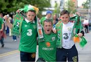 7 June 2015; Republic of Ireland supporters Shane McCormack, centre, with his two sons John, left, age 12, and John, age 11, from Mullingar, Co. Westmeath, on their way to the game. Three International Friendly, Republic of Ireland v England. Aviva Stadium, Lansdowne Road, Dublin. Picture credit: Cody Glenn / SPORTSFILE