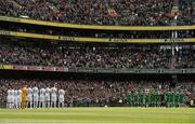 7 June 2015; The Republic of Ireland and England players stand for a minute's silence before the game. Three International Friendly, Republic of Ireland v England. Aviva Stadium, Lansdowne Road, Dublin. Picture credit: David Maher / SPORTSFILE